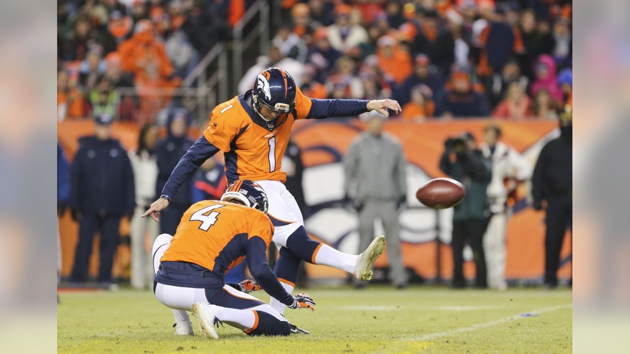 Denver Broncos DeMarcus Ware (94) and Malik Jackson wrap up