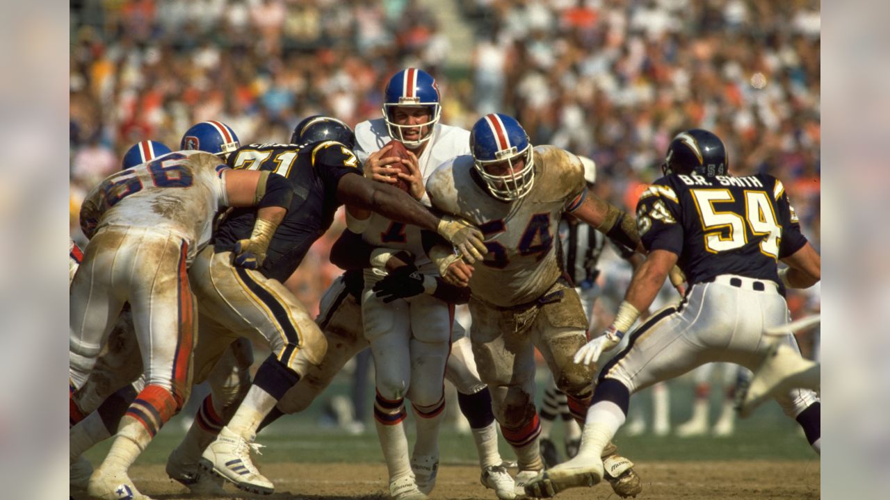 Dan Fouts of the San Diego Chargers drops back to pass against the