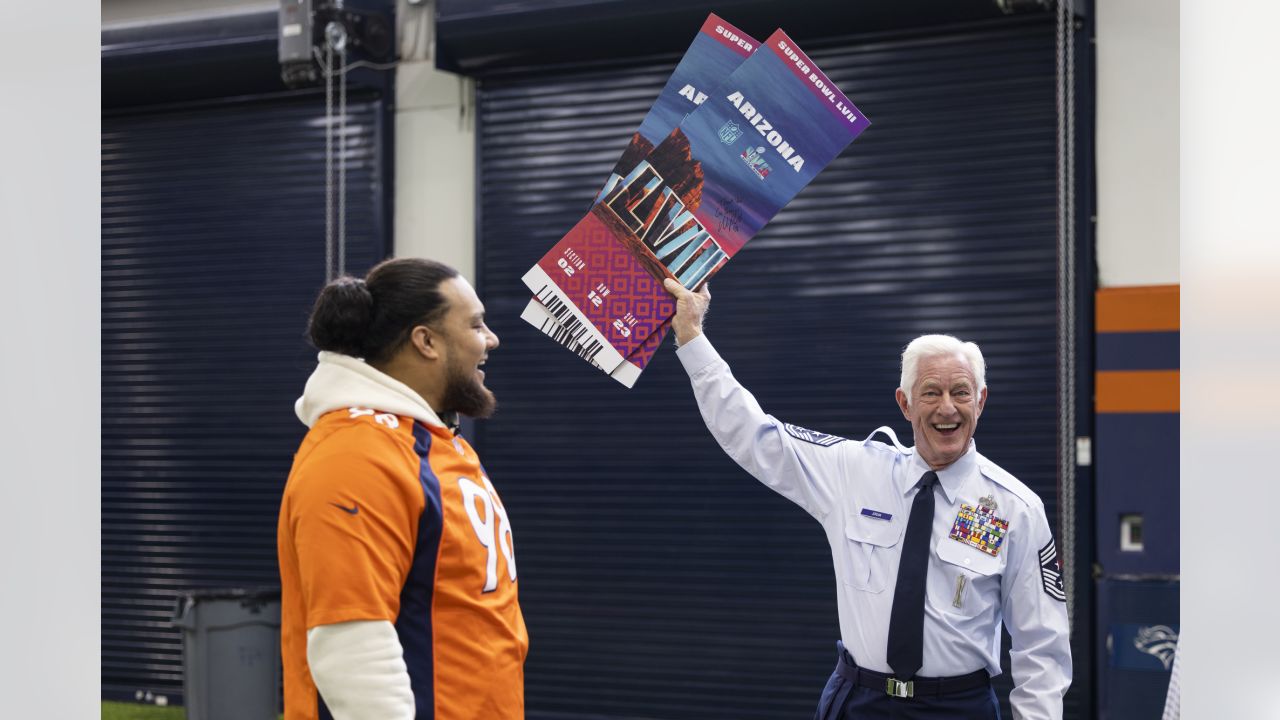 Photos: Mike Purcell surprises Air Force veteran with tickets to