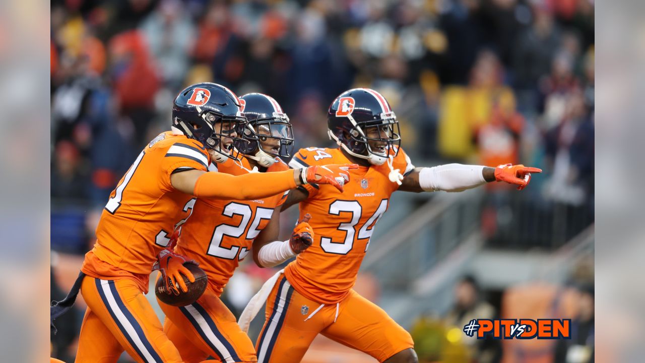 Pittsburgh Steelers vs. Denver Broncos. Fans support on NFL Game.  Silhouette of supporters, big screen with two rivals in background Stock  Photo - Alamy