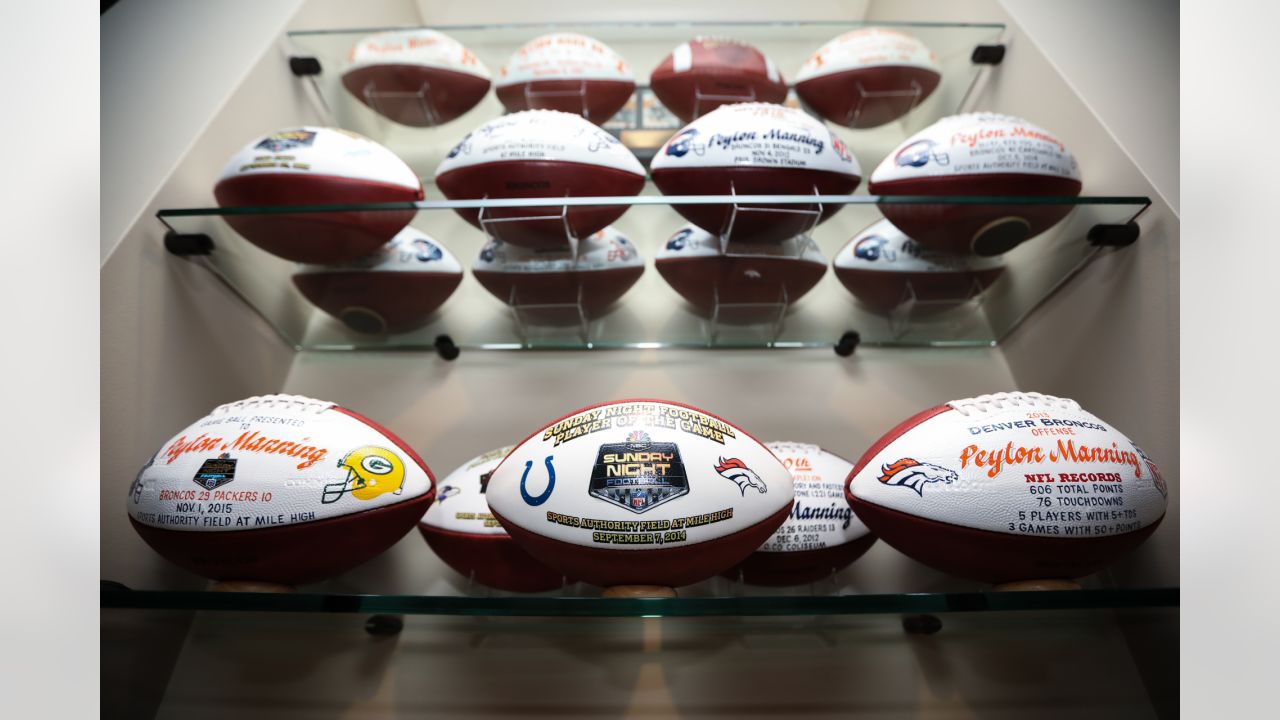 Photos: A peek inside Peyton Manning's game ball collection