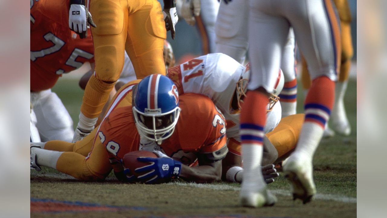 Denver Broncos Dre' Bly intercepts a pass intended for New York