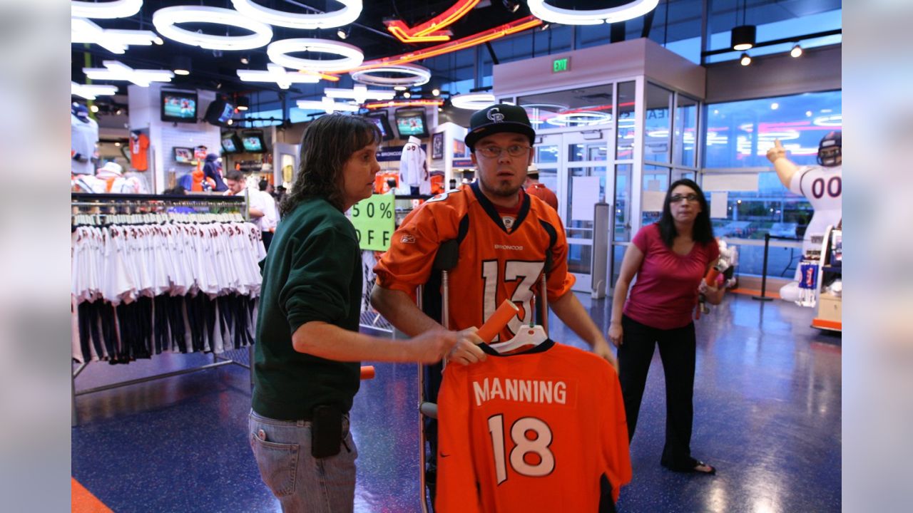 3 women wearing tim tebow denver broncos jerseys by Leah S. Photo stock -  StudioNow