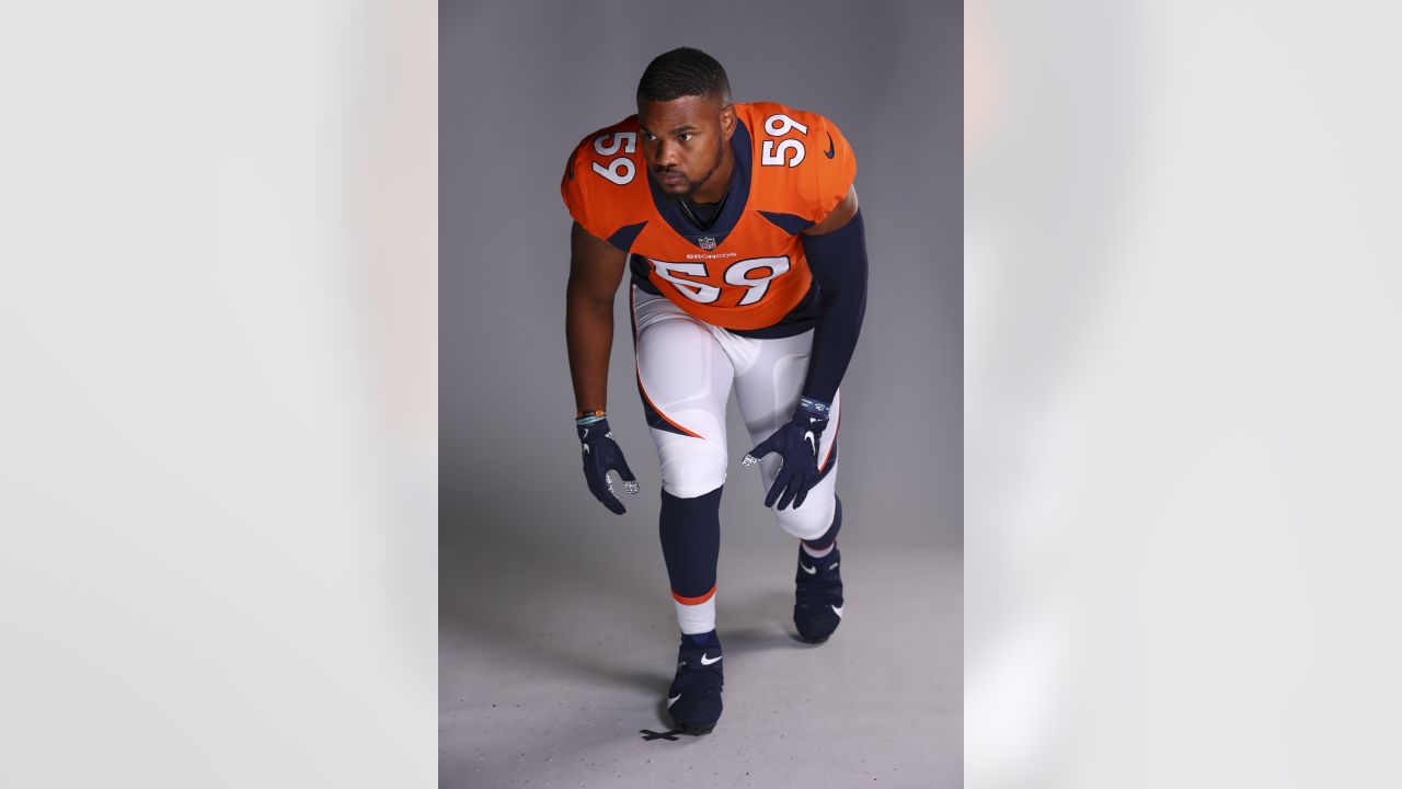 Denver Broncos linebacker Al Wilson stretches before taking part in the  opening day of the team's minicamp, Thursday, July 6, 2006, in southeast  Denver. The Broncos are running three days of minicamps