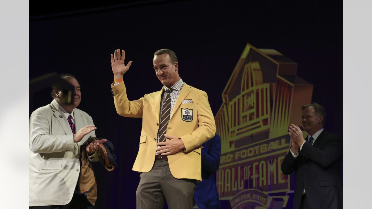 NFL Hall of Famer Peyton Manning trades in gold jacket for a