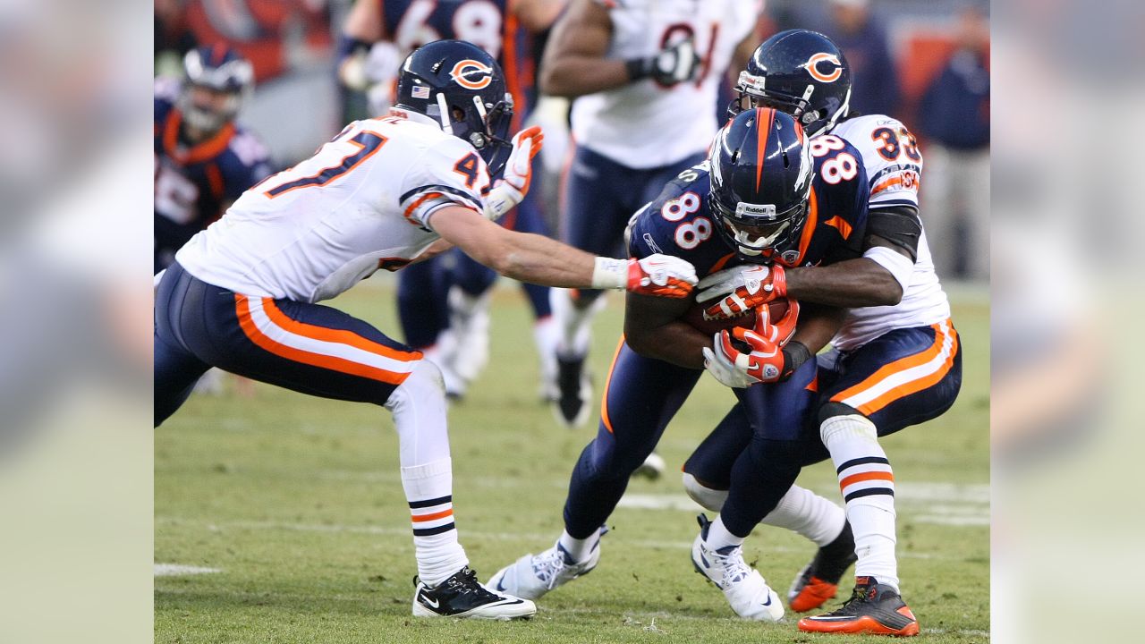 Denver Broncos guard Zane Beadles (68) congratulates wide receiver Demaryius  Thomas (88) after Thomas caught a pass for a touchdown in the third quarter  of an NFL football game, Sunday, Dec. 2