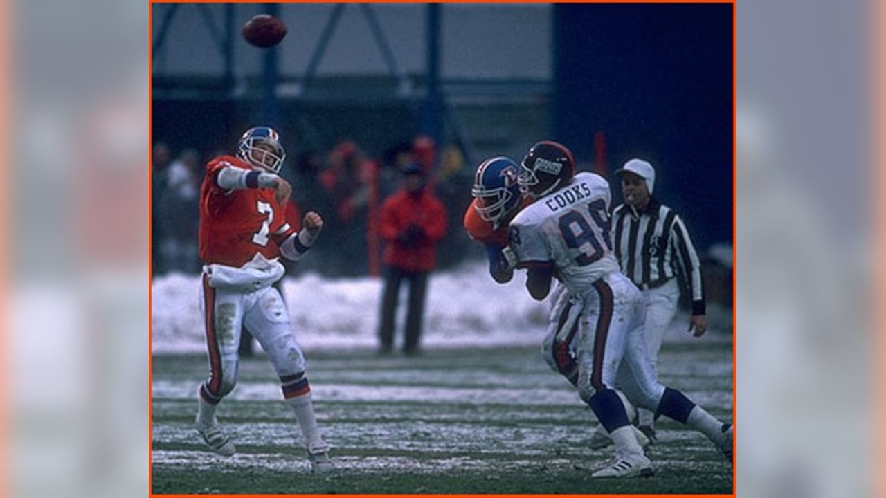 Quarterbacks JOHN ELWAY (7) and GARY KUBIAK (8) with defensive