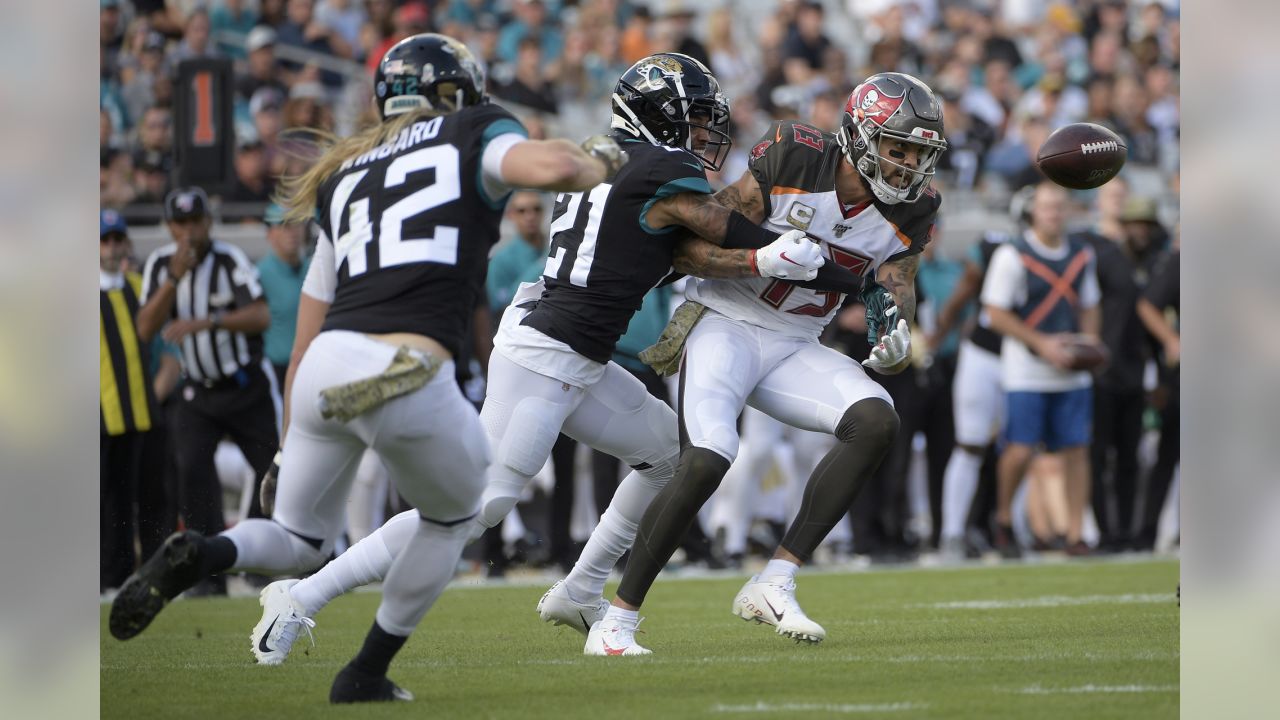 Jacksonville Jaguars tight end Chris Manhertz (84) walks off the field  after an NFL football game against the Denver Broncos at Wembley Stadium in  London, Sunday, Oct. 30, 2022. The Denver Broncos