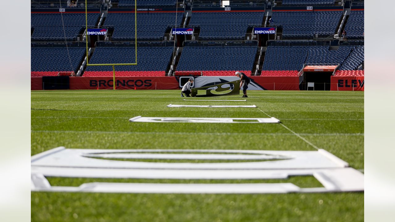 Painting a Broncos Hall of Fame wall at the Empower Field on the Team store.  : r/DenverBroncos