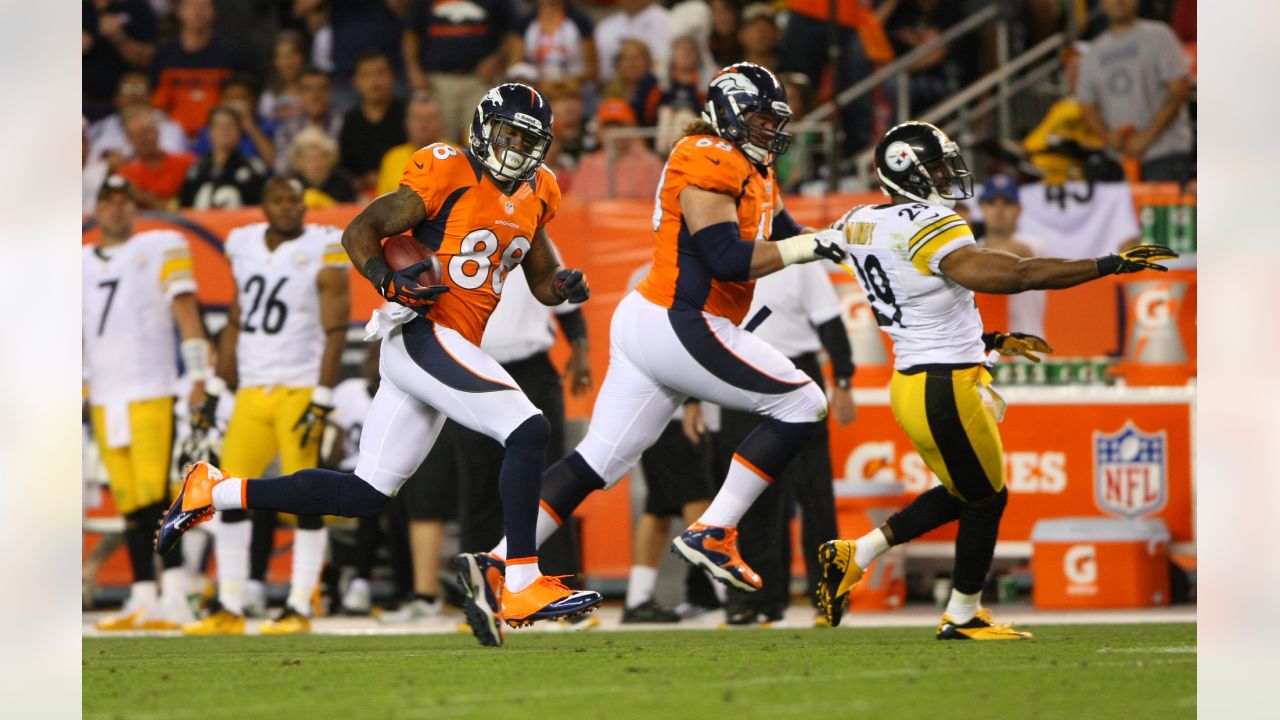 Manning throws for 3 TDs in Broncos' 30-23 win