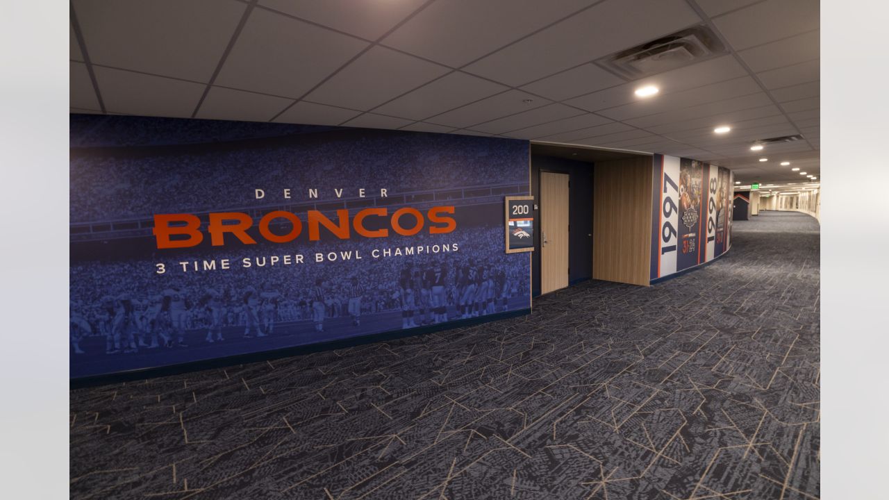 Painting a Broncos Hall of Fame wall at the Empower Field on the Team store.  : r/DenverBroncos