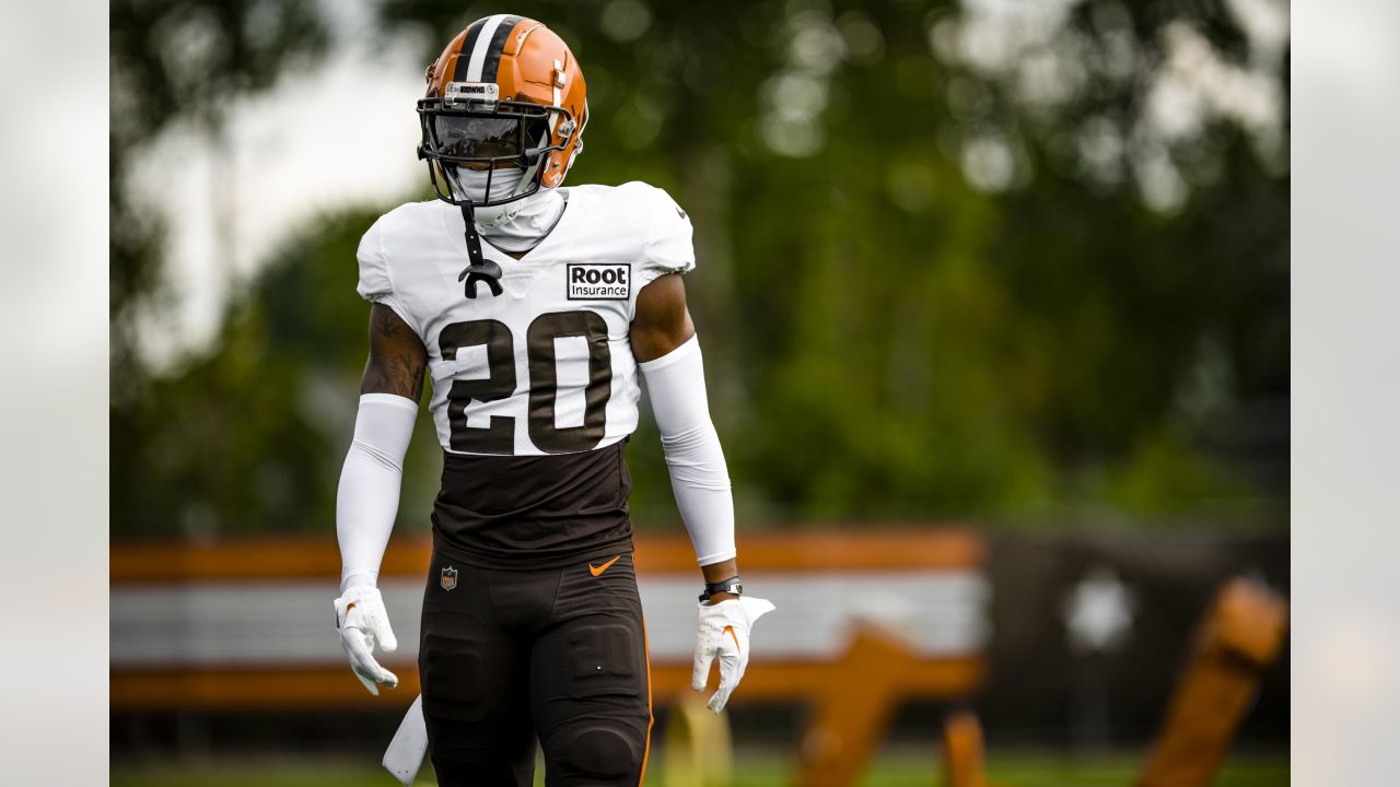 Cleveland Browns offensive tackle James Hudson III (66) walks back to the  line of scrimmage during