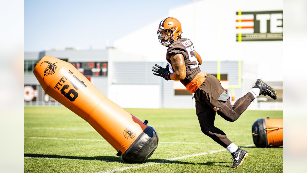 Cleveland Browns defensive end Romeo McKnight (57) runs off of the