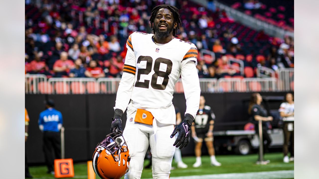 Myles Garrett Cleveland Browns Unsigned Celebrates A Sack in White Jersey Photograph