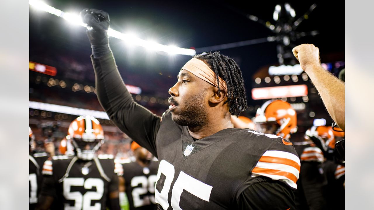 Jedrick Wills Jr. #71 of the Cleveland Browns walks to the bench