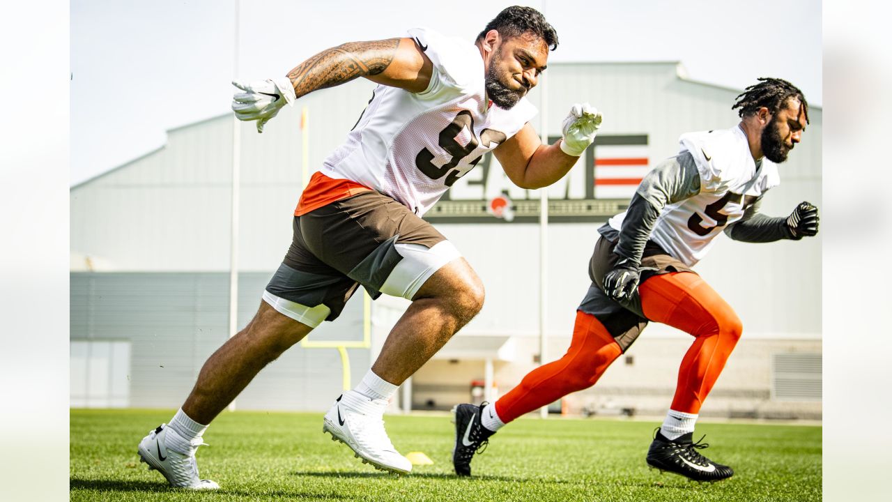 Cleveland Browns safety Richard LeCounte III runs a drill during an NFL  football rookie minicamp at the team's training camp facility, Friday, May  14, 2021, in Berea, Ohio. (AP Photo/Tony Dejak Stock