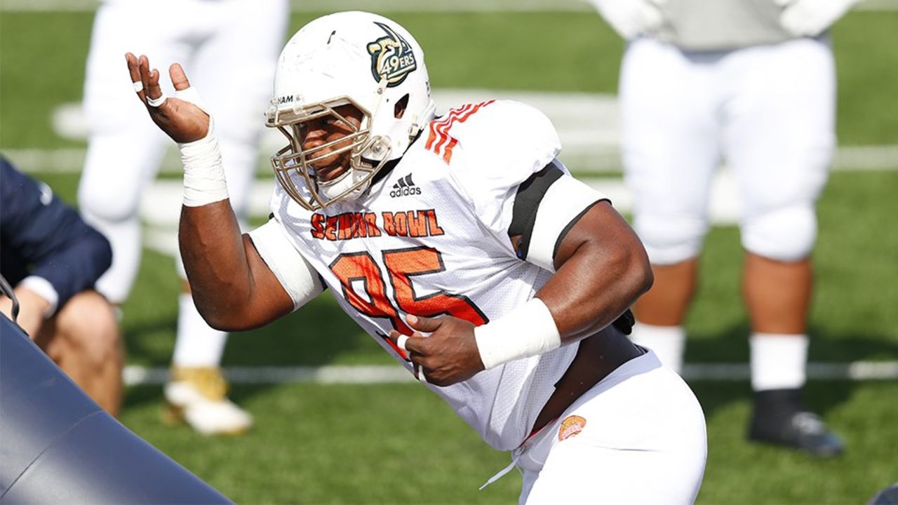 Larry Ogunjobi squatting over 700 pounds - Sports Illustrated