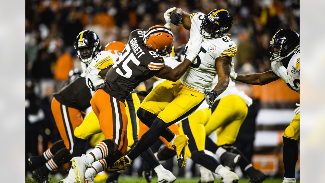 Cleveland Browns defensive end Myles Garrett runs on the field during an NFL  preseason football game