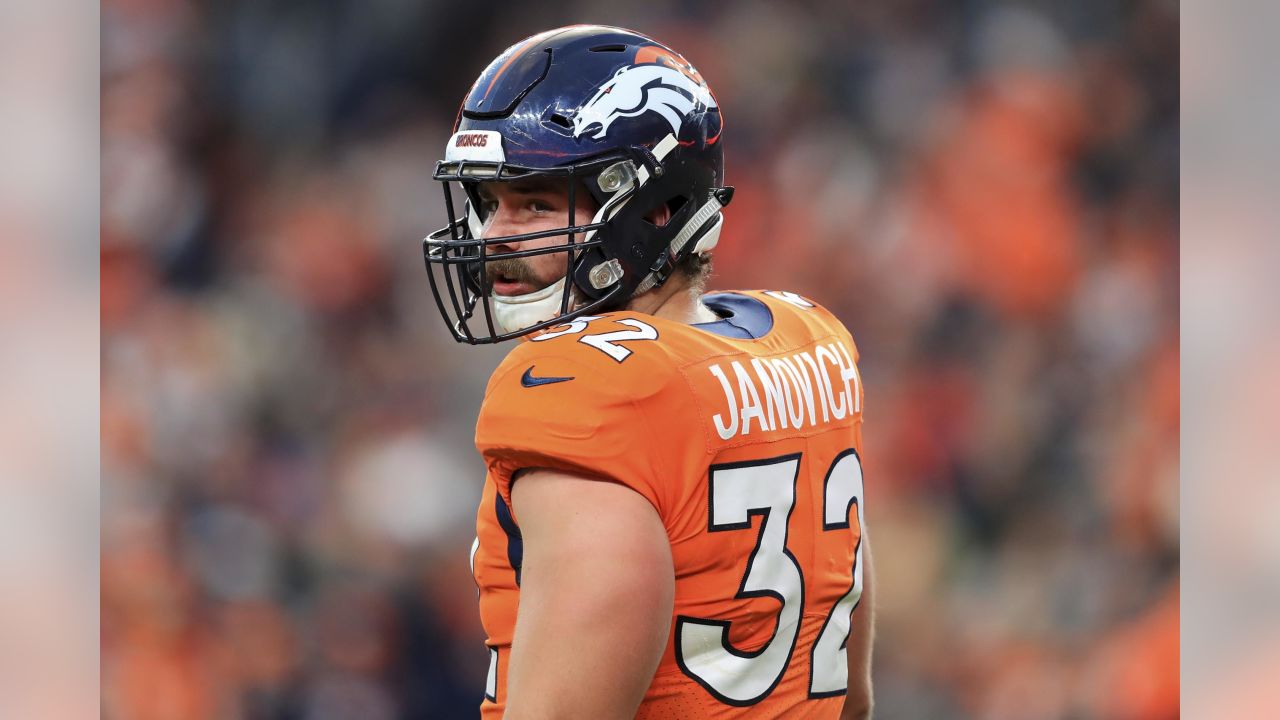 Denver Broncos fullback Andy Janovich (32) takes part in drills