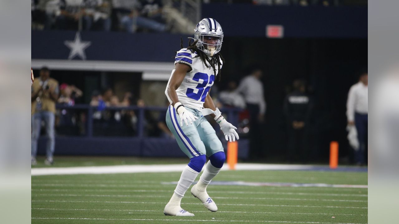 Aug 29, 2019: Dallas Cowboys cornerback Donovan Olumba #32 carries the ball  back for a touchdown after making an interception in the first quarter  during an NFL preseason game between the Tampa