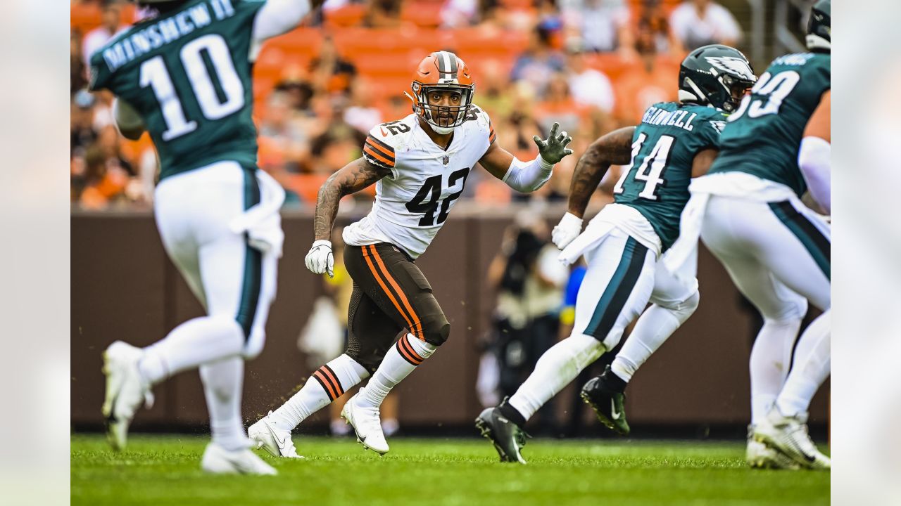 Cleveland Browns quarterback Joshua Dobbs (15) looks to hand off the ball  during an NFL pre-season football game against the Cleveland Browns,  Friday, Aug. 11, 2023, in Cleveland. (AP Photo/Kirk Irwin Stock