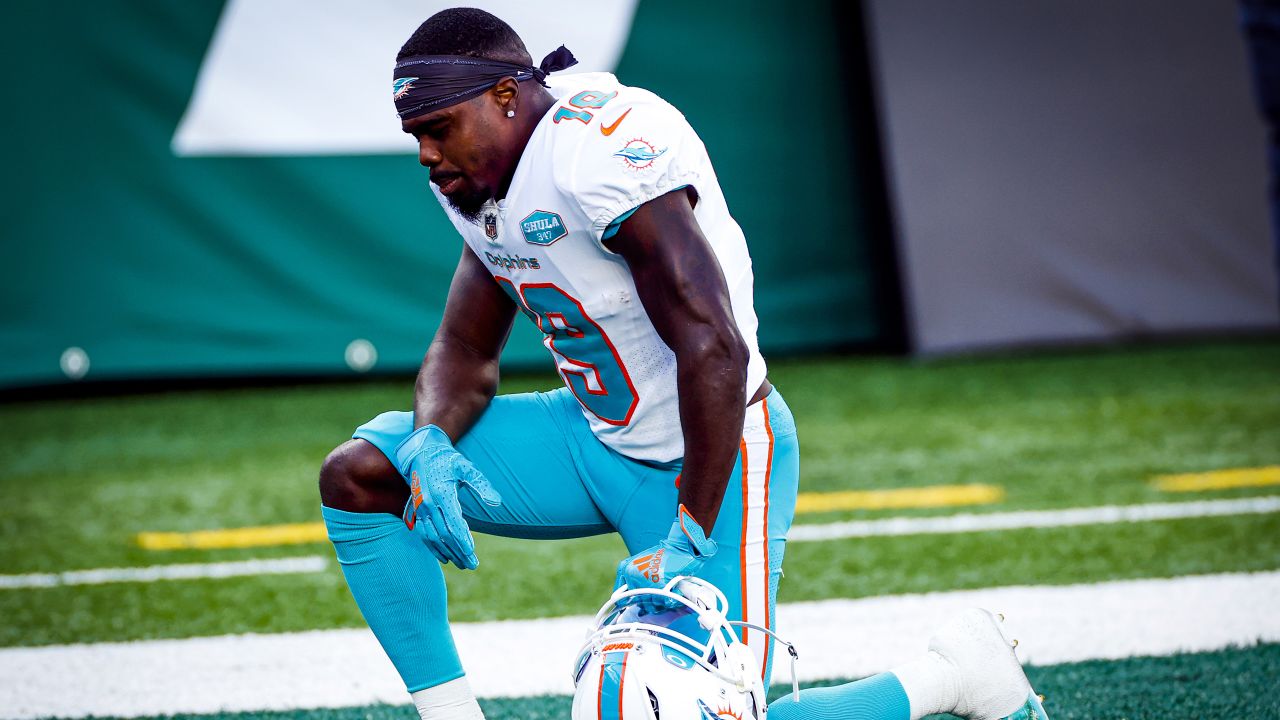 Dolphins wide receiver Jakeem Grant attempts 50 yard throw 