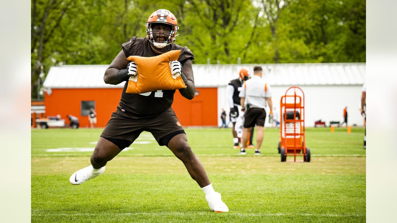 Cleveland Browns rookie Ryan Greenhagen (59) and Storey Jackson