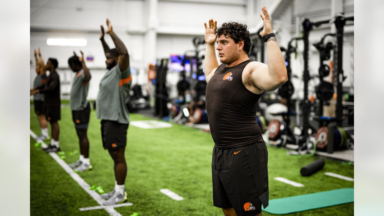 Cleveland Browns rookie Ryan Greenhagen (59) and Storey Jackson