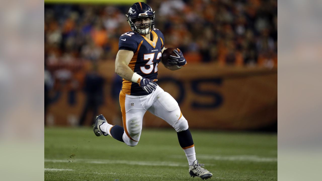 Denver Broncos fullback Andy Janovich (32) takes part in drills