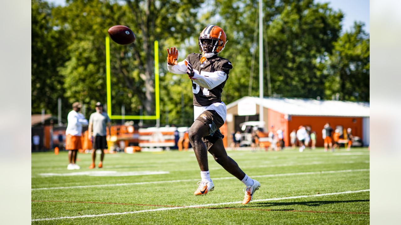 James Hudson III getting advice from Joe Thomas, aims at mastering