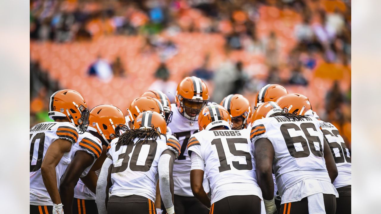 Cleveland Browns quarterback Joshua Dobbs (15) looks to hand off the ball  during an NFL pre-season football game against the Cleveland Browns,  Friday, Aug. 11, 2023, in Cleveland. (AP Photo/Kirk Irwin Stock