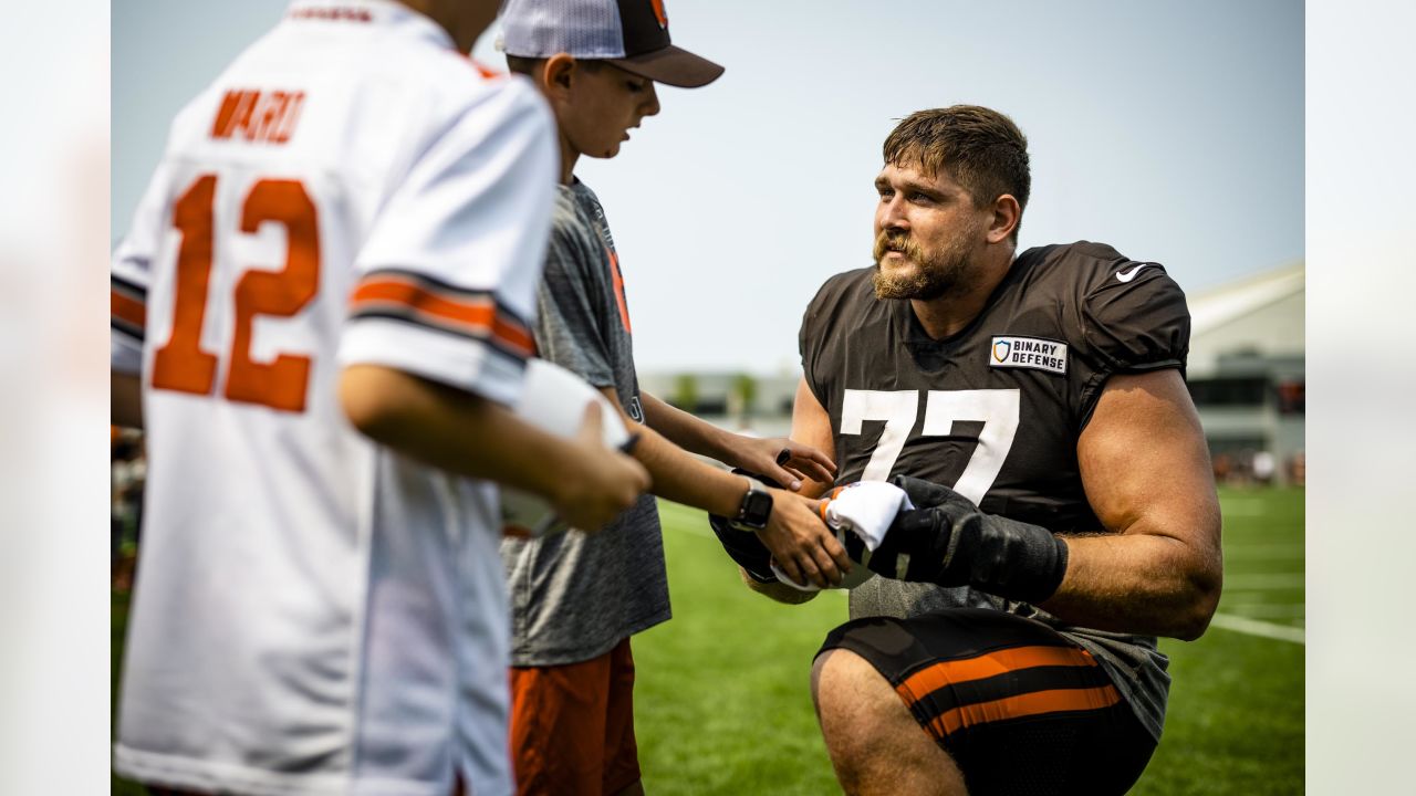 Cleveland Browns defensive tackle Devaroe Lawrence walks out on the field  during practice at the NFL football team's training camp facility,  Thursday, July 25, 2019, in Berea, Ohio. (AP Photo/Tony Dejak Stock