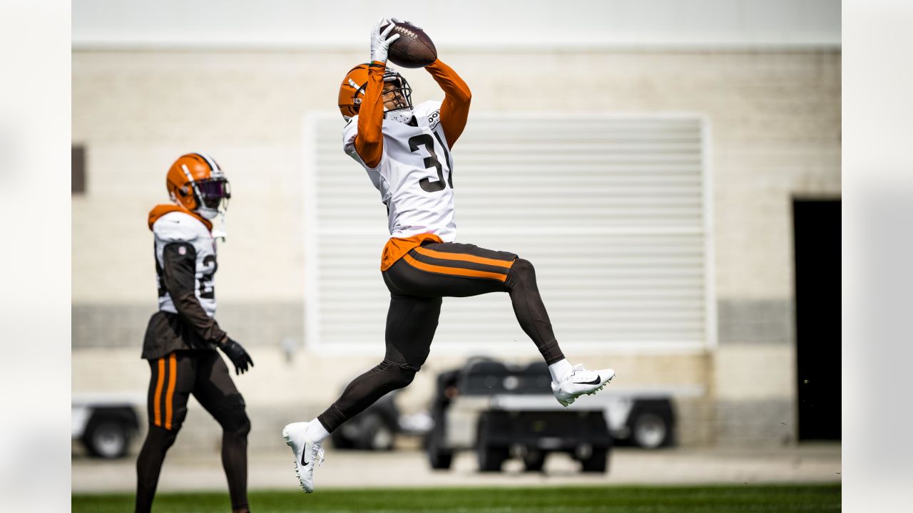 Cleveland Browns offensive tackle James Hudson III (66) walks back to the  line of scrimmage during