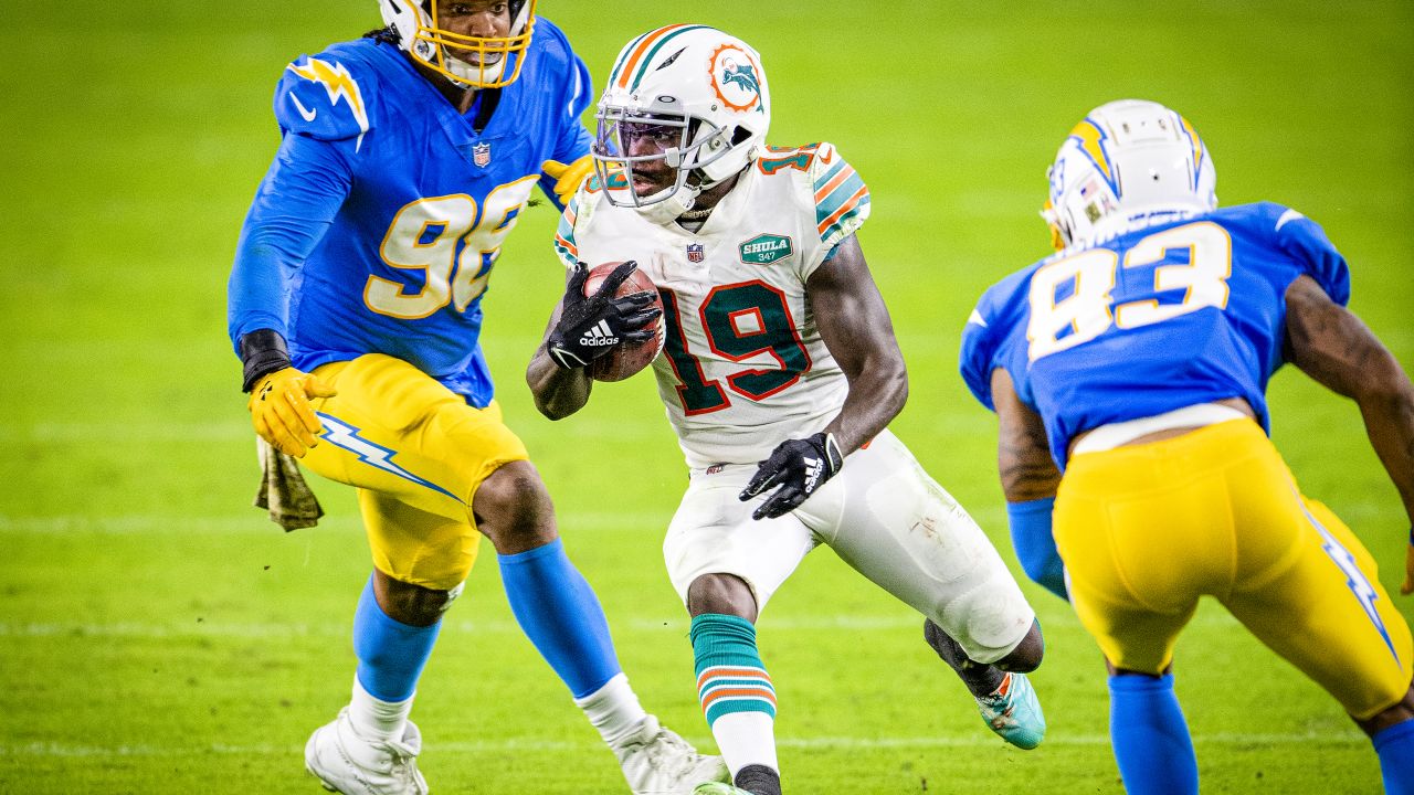 Las Vegas Raiders wide receiver Tyron Johnson (1) runs with the ball during  an NFL football game against the Miami Dolphins, Saturday, Aug. 20, 2022,  in Miami Gardens, Fla. (AP Photo/Doug Murray