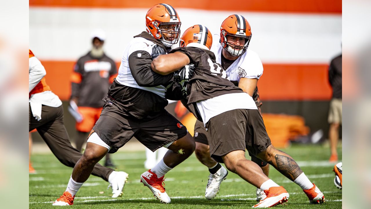 Cleveland Browns offensive guard Eric Kush (72) and center JC Tretter (64)  line up during an NFL football game against the Los Angeles Rams, Sunday,  Sept. 22, 2019, in Cleveland. The Rams