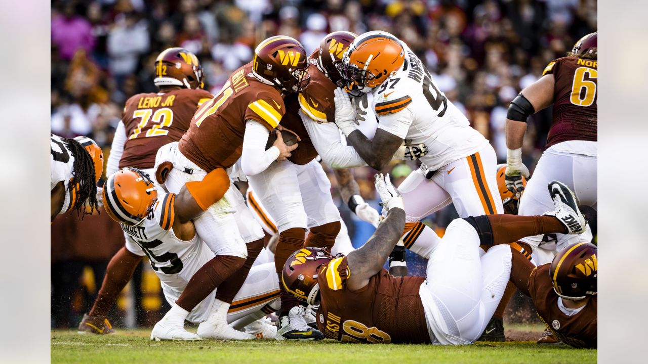 Cleveland Browns defensive end Myles Garrett runs on the field during an NFL  preseason football game