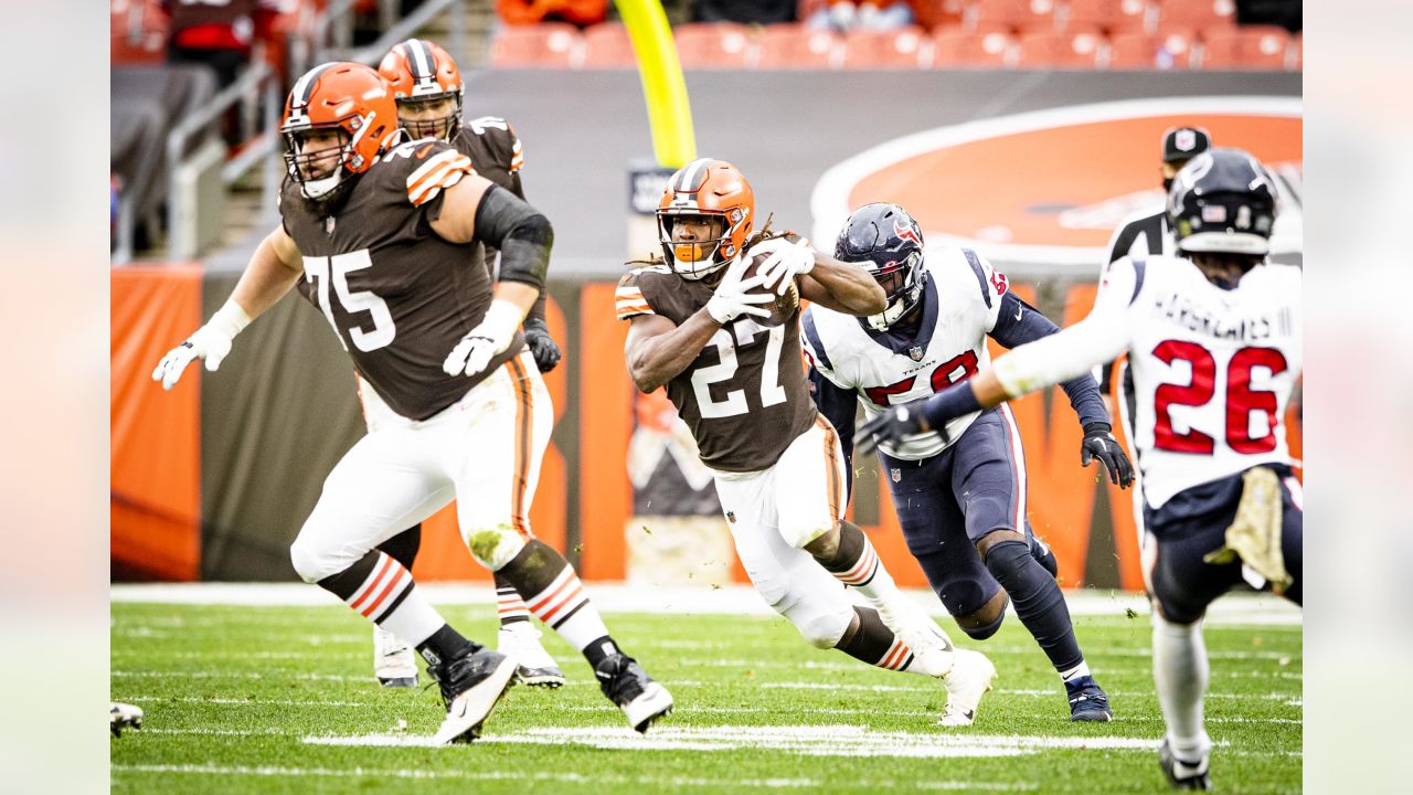 Cleveland Browns wide receiver Derrick Willies (84) holds off Cleveland  Browns defensive back Sheldrick Redwine (33) after a pass reception during  practice at the NFL football team's training facility Wednesday, July 31