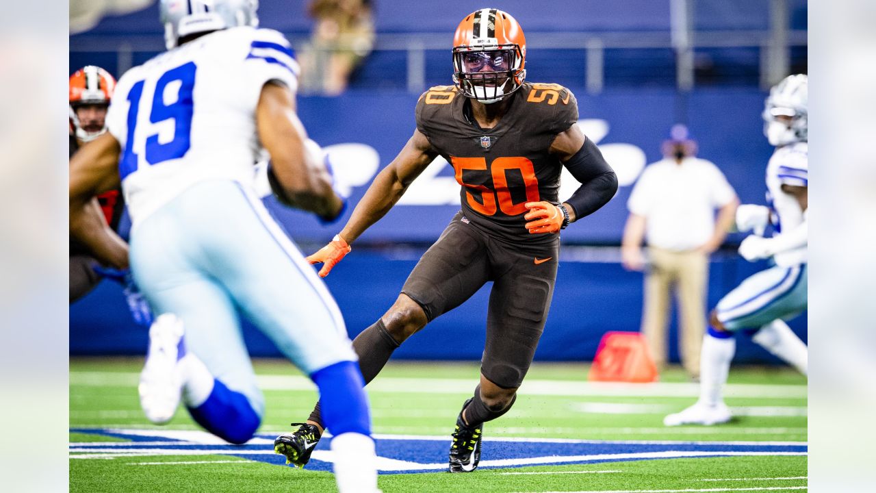 Cleveland Browns linebacker Jacob Phillips (50) drops back in coverage  during an NFL pre-season football game against the Washington Commanders,  Friday, Aug. 11, 2023, in Cleveland. (AP Photo/Kirk Irwin Stock Photo -  Alamy