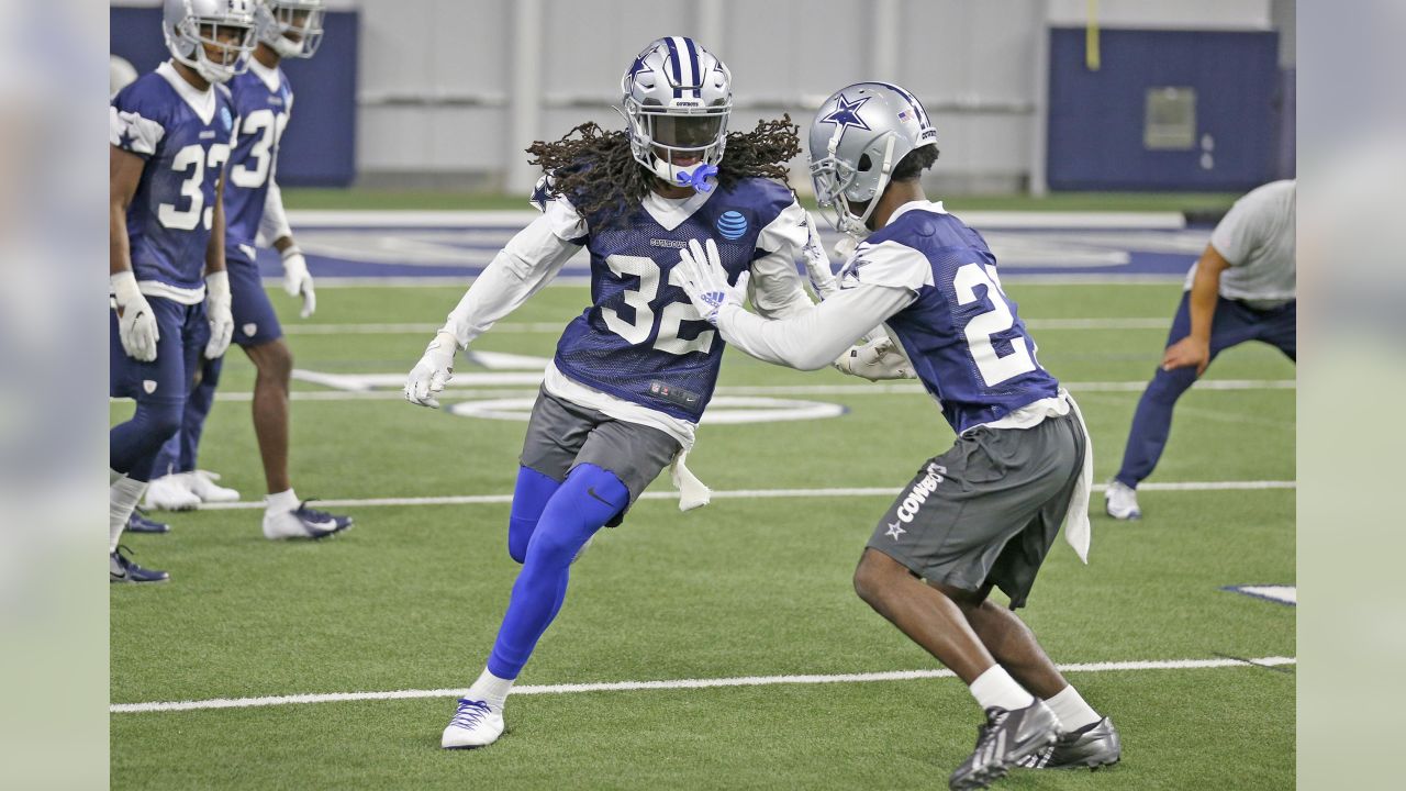 Aug 29, 2019: Dallas Cowboys cornerback Donovan Olumba #32 carries the ball  back for a touchdown after making an interception in the first quarter  during an NFL preseason game between the Tampa