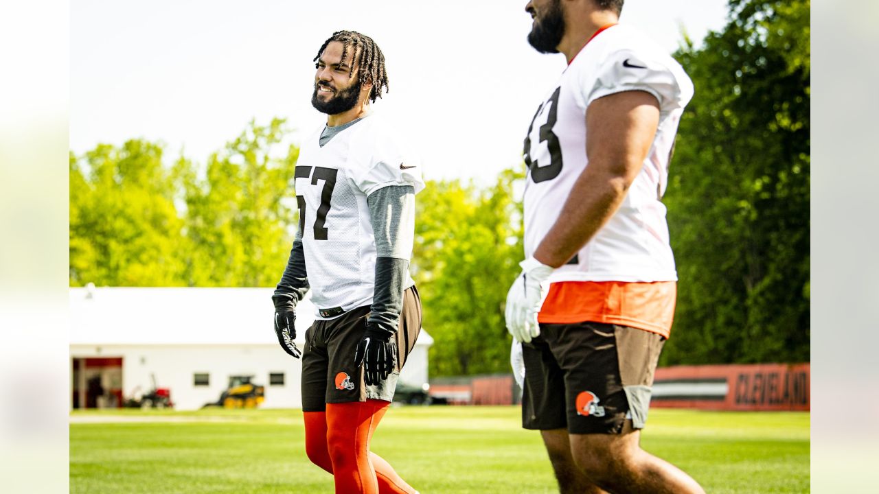 Cleveland Browns defensive end Romeo McKnight (57) runs off of the