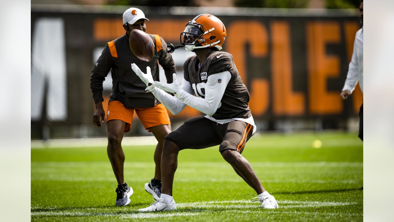 Cleveland Browns offensive tackle James Hudson III (66) walks back