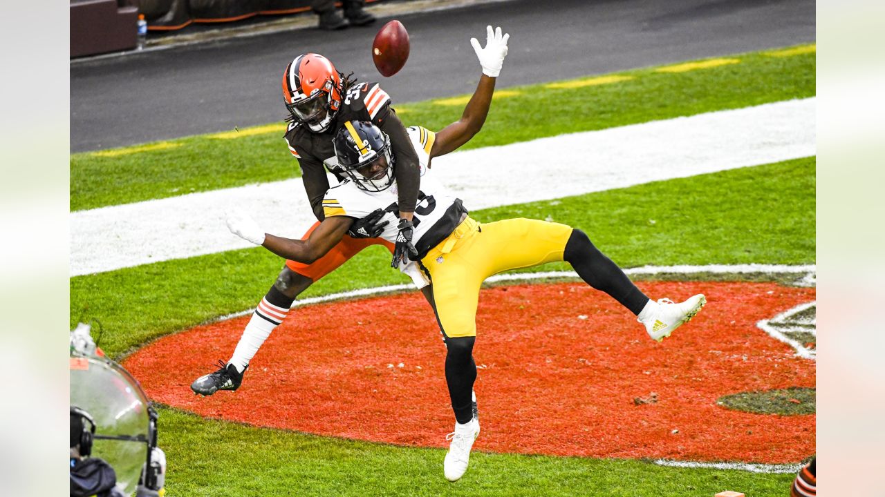 In this Nov. 29, 2020 photo, Cleveland Browns safety Ronnie Harrison Jr.  (33) wears a Salute to Service headband during warm-ups before an NFL  football game against the Jacksonville Jaguars in Jacksonville