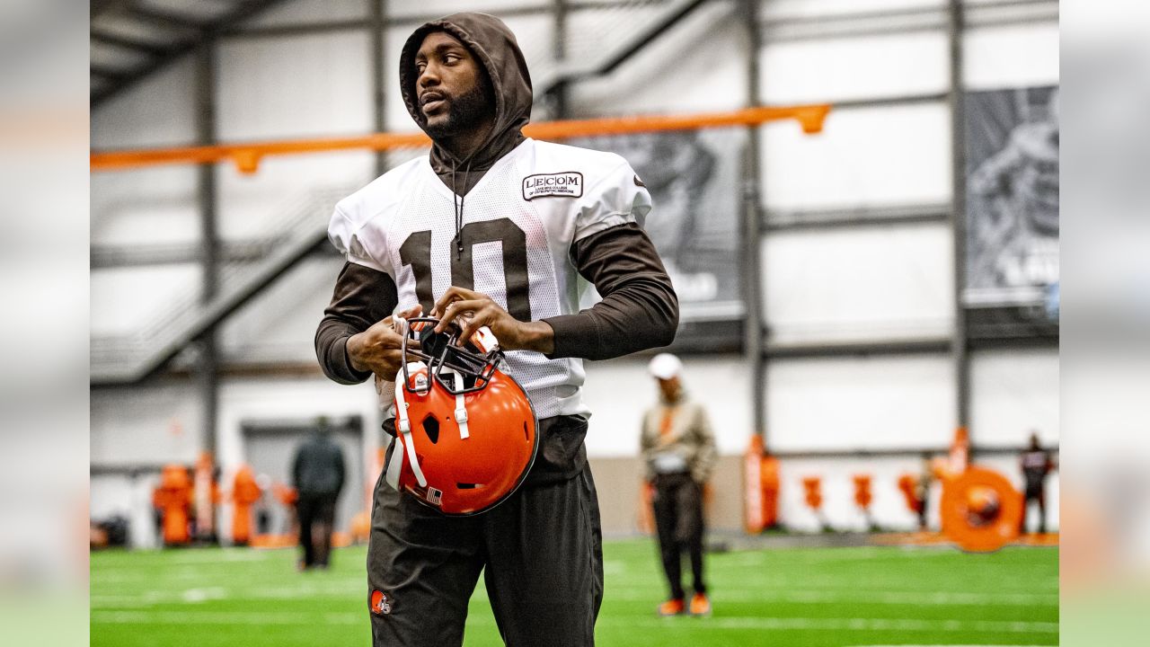 Cleveland Browns' Montrel Meander (41) greets teammates before an