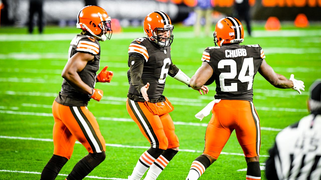 Cleveland Browns vs. Baltimore Ravens . NFL Game. American Football League  match. Silhouette of professional player celebrate touch down. Screen in ba  Stock Photo - Alamy