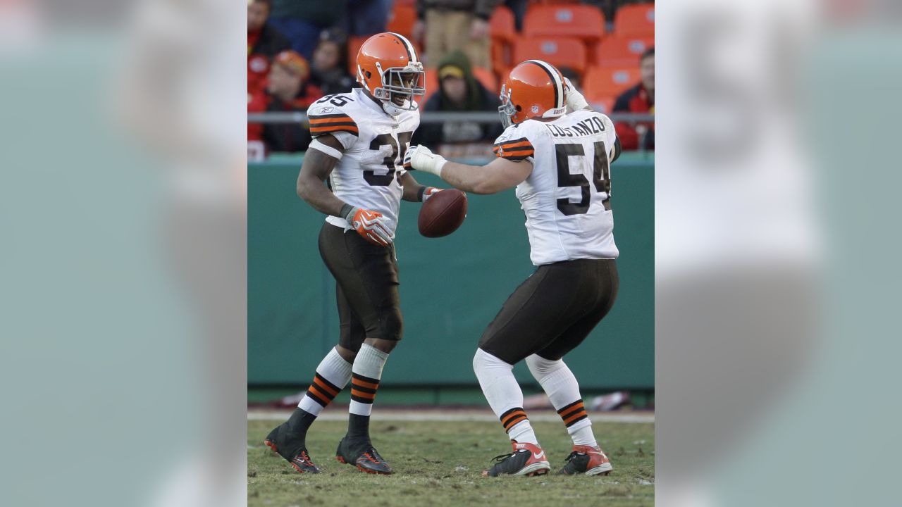 Cleveland Browns quarterback Brady Quinn (10) hands off to running back  Jerome Harrison (35) during the NFL football game between the Kansas City  Chiefs and the Cleveland Browns at Arrowhead Stadium in