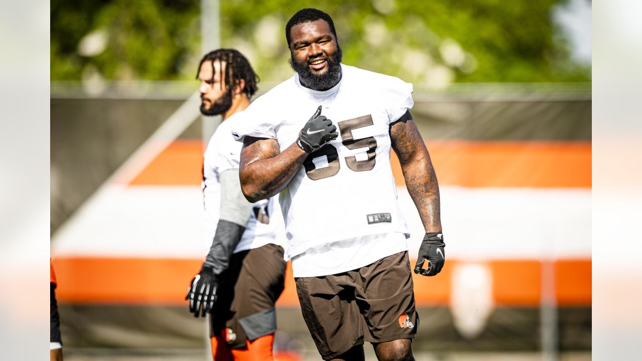 Cleveland Browns safety Richard LeCounte III runs a drill during an NFL  football rookie minicamp at the team's training camp facility, Friday, May  14, 2021, in Berea, Ohio. (AP Photo/Tony Dejak Stock