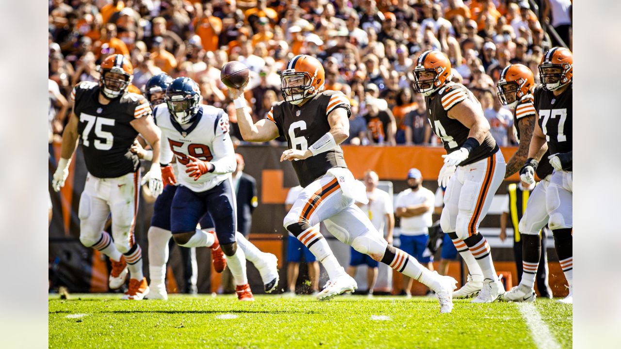 Cleveland Browns quarterback Baker Mayfield (6) calls a play in the first  quarter of an NFL football game against the Miami Dolphins, Sunday, Nov.  24, 2019, in Cleveland. The Browns won 41-24. (