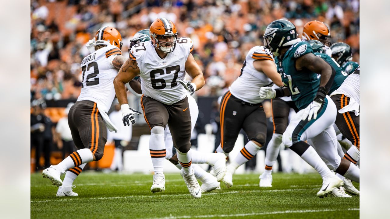 Cleveland Browns offensive tackle Ben Petrula (67) and center Brock Hoffman  (57) block during the second half of a preseason NFL football game against  the Jacksonville Jaguars, Friday, Aug. 12, 2022, in