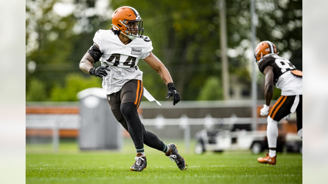 Cleveland Browns offensive tackle James Hudson III (66) walks back