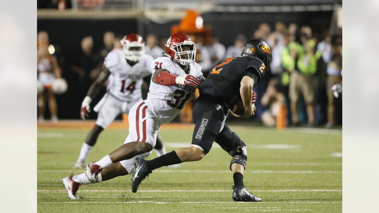 Cleveland Browns defensive end Ogbo Okoronkwo (54) rushes against Kansas  City Chiefs offensive tackle Prince Tega Wanogho (76) during an NFL  preseason football game Saturday, Aug. 26, 2023, in Kansas City, Mo. (